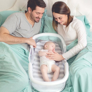 baby bassinet by bed