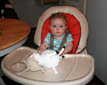 Lucie with lambie starting solids
