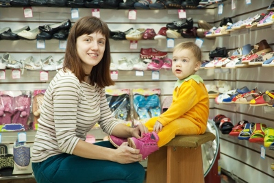 baby in shoe store