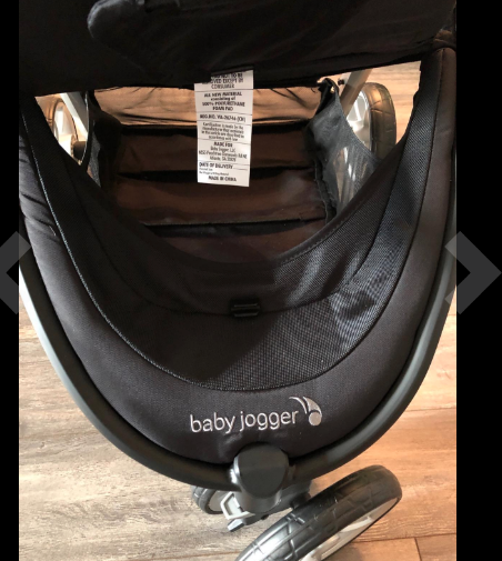 Baby Jogger City Mini 2 review under storage access from under leg rest.
