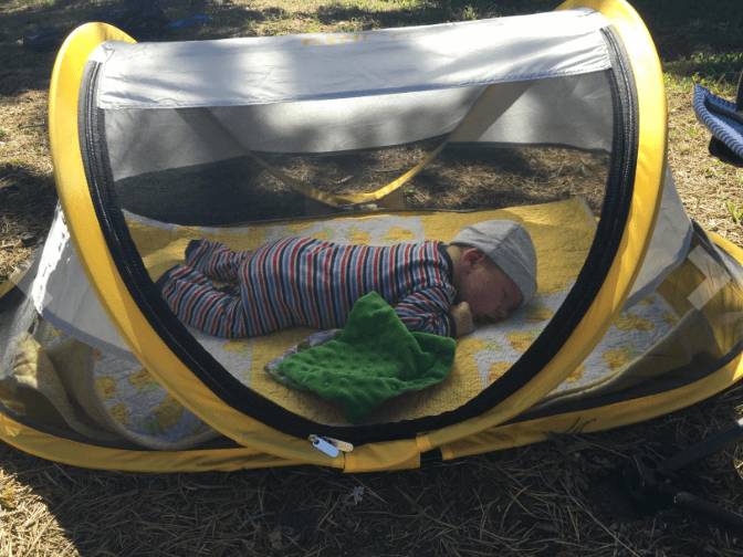 family camping peapod baby sleeping