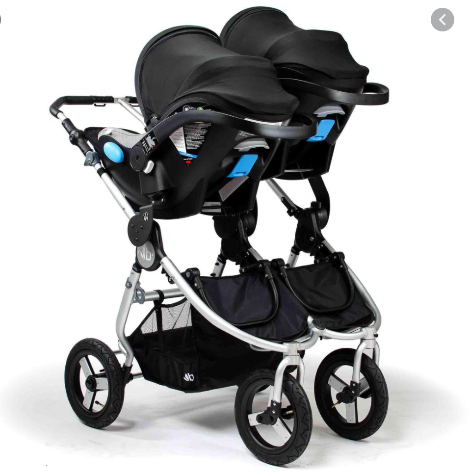 twin travel system side by side