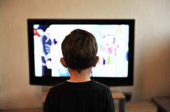 boy in front of screen