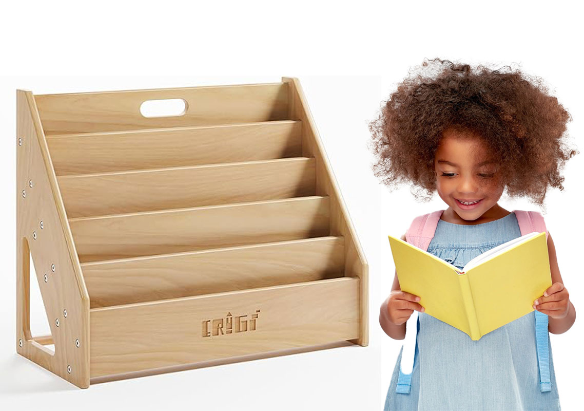 kid next to montessori bookshelf